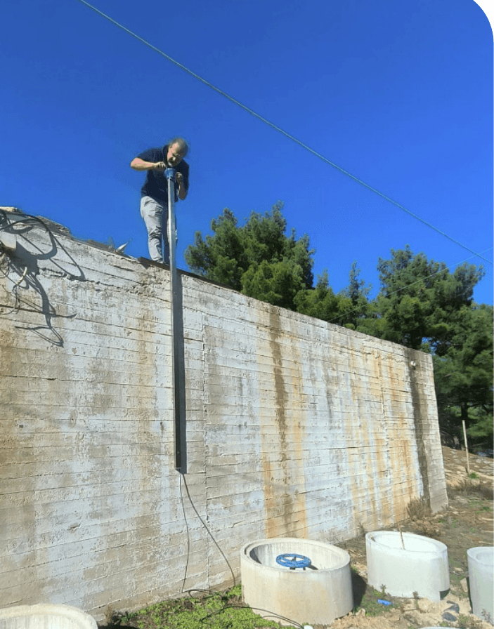 AFAS sensor pole mounted on a flood wall, Ikaria